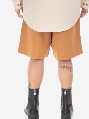 Pamučne kratke hlače New Balance narančasta