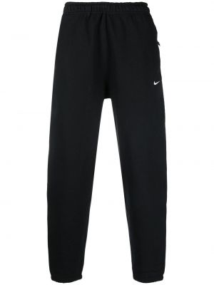 Šněrovací bavlněné sportovní kalhoty s výšivkou Nike
