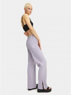 Bavlnené priliehavé nohavice Calvin Klein Jeans fialová