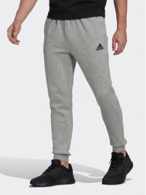 Fleecové priliehavé teplákové nohavice Adidas sivá