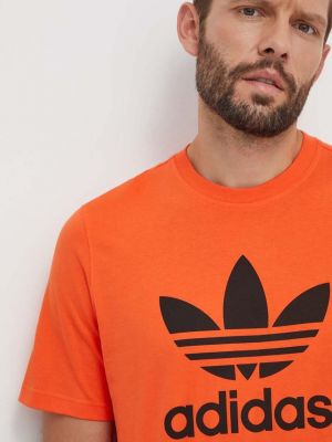 Памучна тениска с дълъг ръкав с принт Adidas Originals оранжево
