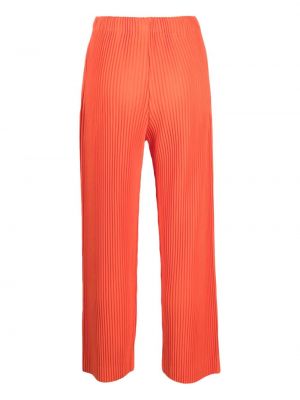 Plisované rovné kalhoty Issey Miyake oranžové