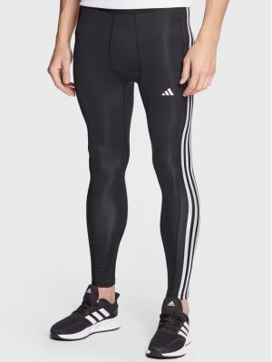 Černé pruhované slim fit sportovní kalhoty Adidas