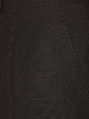 Vlnené nohavice s vysokým pásom Gabriela Hearst čierna