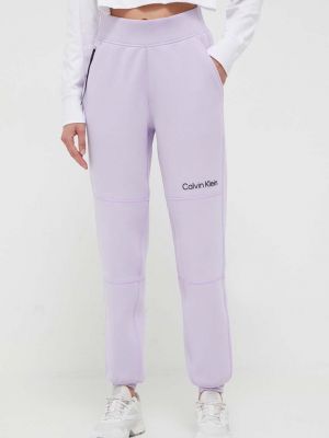 Kalhoty Calvin Klein Performance fialové
