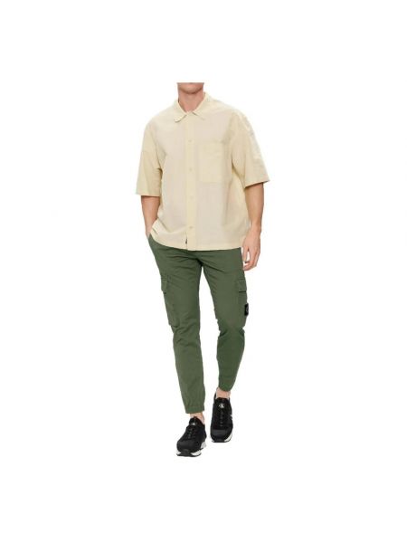 Pantalones de algodón con bolsillos Calvin Klein Jeans verde
