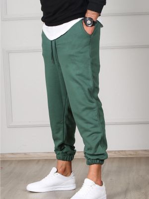 Sportovní kalhoty Madmext zelené