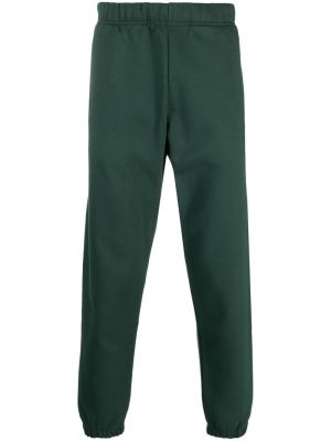Bavlnené teplákové nohavice s výšivkou Carhartt Wip zelená