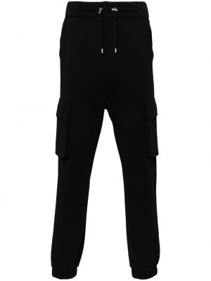 Bavlnené teplákové nohavice s potlačou Balmain čierna