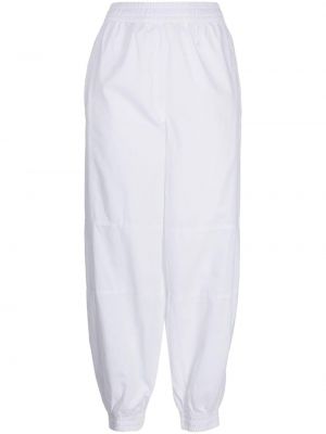 Bavlněné sportovní kalhoty Lacoste bílé
