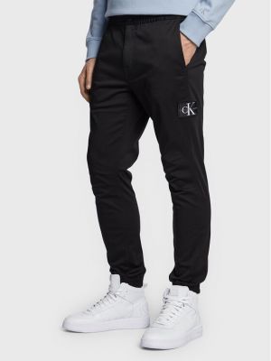 Donji dijelovi za trčanje slim fit Calvin Klein Jeans crna
