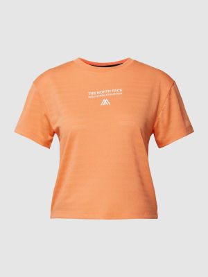 Koszulka z nadrukiem The North Face pomarańczowa