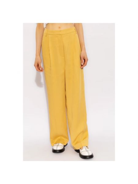 Pantalones plisados Munthe amarillo