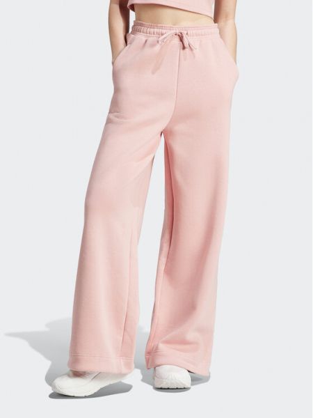 Hlače bootcut Adidas ružičasta