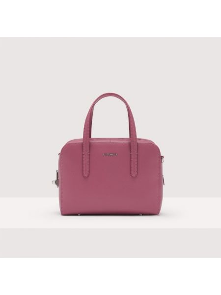 Розовая кожаная сумка Coccinelle