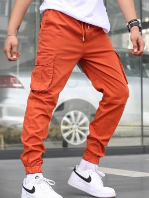 Oranžové běžecké kalhoty Madmext