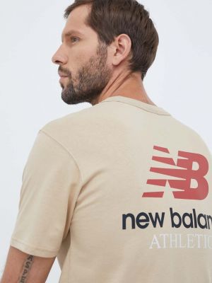 Bavlněné tričko New Balance béžové