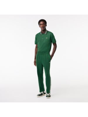 Зеленые спортивные штаны Lacoste
