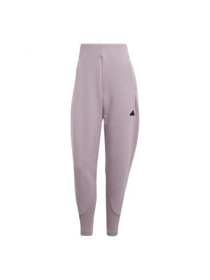 Priliehavé teplákové nohavice Adidas fialová