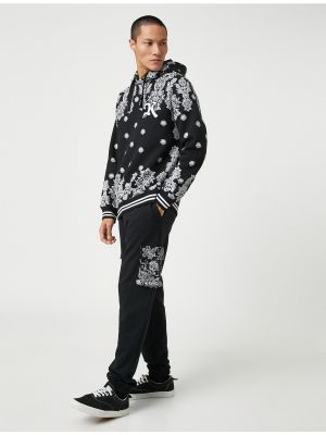 Kargo hlače s cvetličnim vzorcem z žepi Koton črna
