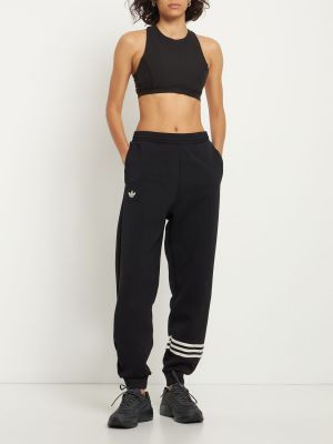 Pruhované běžecké kalhoty Adidas Originals černé