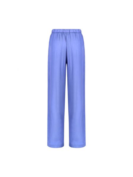 Spodnie relaxed fit Emporio Armani niebieskie