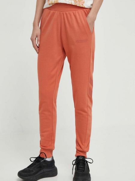 Spodnie sportowe z nadrukiem Hummel pomarańczowe