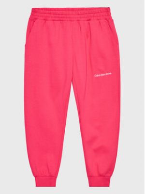 Sportovní kalhoty relaxed fit Calvin Klein Jeans růžové