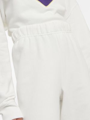 Bavlnené teplákové nohavice Tory Sport biela