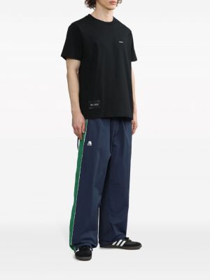 Pruhované sportovní kalhoty Izzue modré