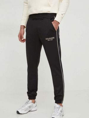Sportovní kalhoty s aplikacemi Tommy Hilfiger černé