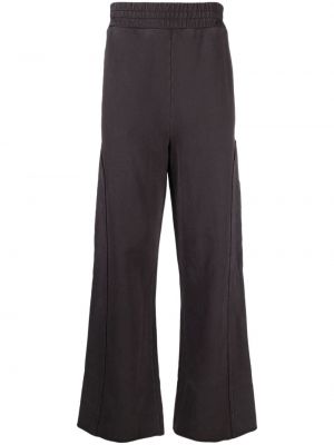 Bavlnené teplákové nohavice s výšivkou Etudes čierna