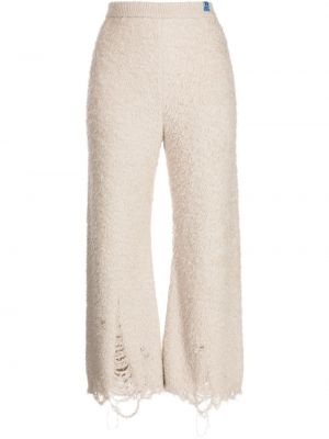 Pantaloni distressed in maglia Maison Mihara Yasuhiro beige
