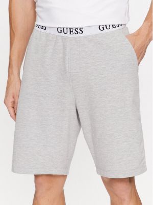 Priliehavé športové šortky Guess sivá