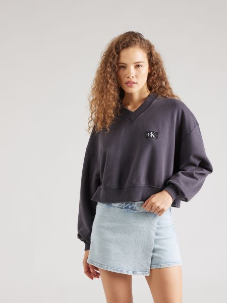 Voľná priliehavá mikina Calvin Klein Jeans sivá