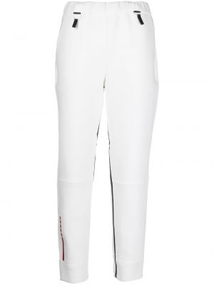 Pantaloni con stampa Prada bianco