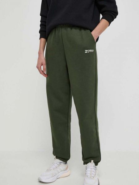 Zielone spodnie sportowe New Balance