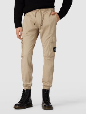 Spodnie cargo w jednolitym kolorze Calvin Klein Jeans beżowe