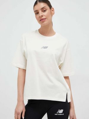 New Balance t-shirt Athletics Remastered női, bézs