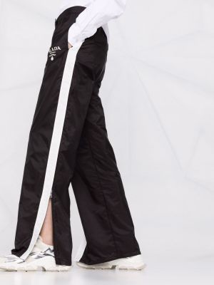 Pruhované sportovní kalhoty z nylonu Prada černé