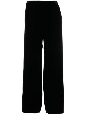 Voľné zamatové nohavice Totême čierna