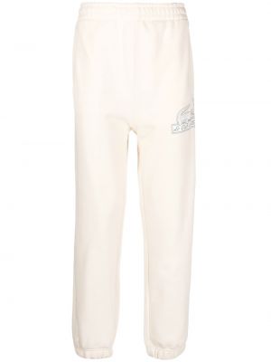 Спортни панталони с принт Lacoste бяло