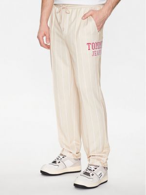 Pantaloni sport cu dungi cu croială lejeră Tommy Jeans bej