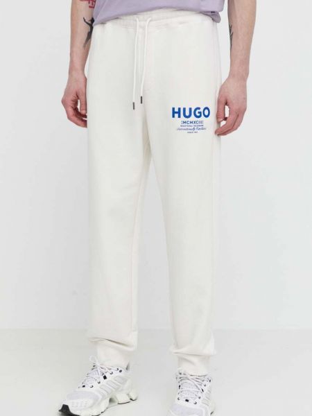 Spodnie sportowe bawełniane z nadrukiem Hugo Blue