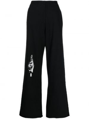 Spodnie sportowe bawełniane z nadrukiem Raf Simons czarne