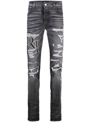 Jeans skinny strappati con stampa Amiri grigio