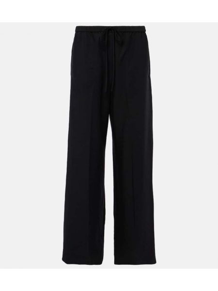 Pantalones de lino lyocell bootcut Totême negro