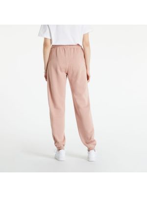 Fleecové sportovní kalhoty Nike růžové