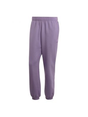 Teplákové nohavice Adidas Originals fialová