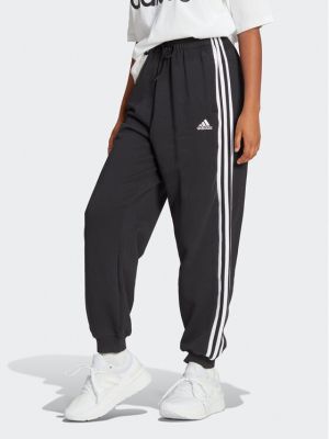 Relaxed спортни панталони на райета Adidas черно